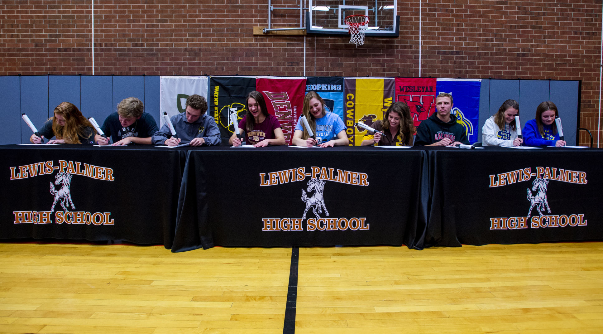 Lewis-Palmer athletes sign their letters of intent 01.JPG